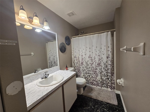 bathroom featuring vanity, curtained shower, and toilet