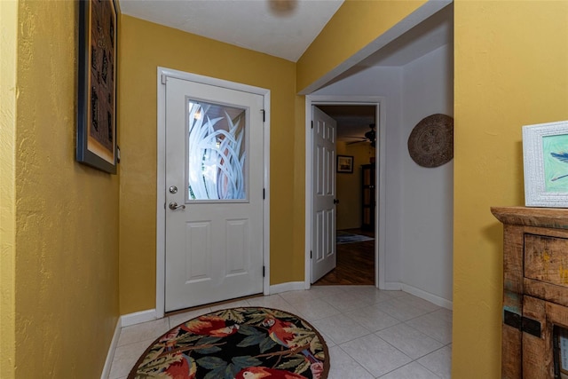 14 Fort Caroline Ln, Palm Coast, FL 32137 - foyer entrance with light tile patterned flooring and baseboards