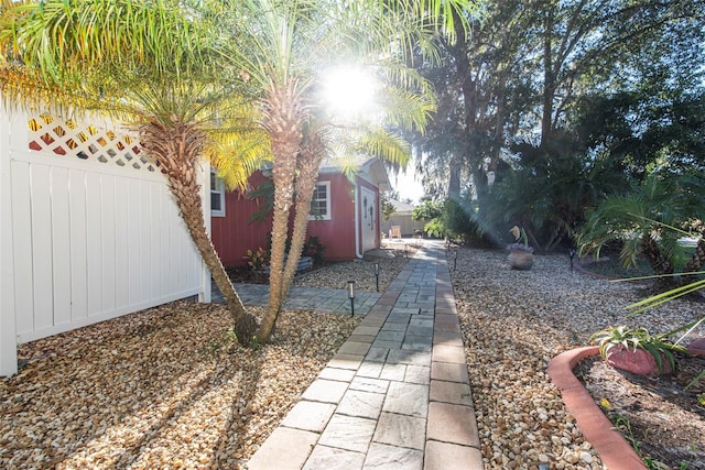 view of yard with an outdoor structure