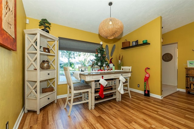 dining room with hardwood / wood-style floors