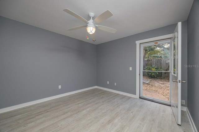 unfurnished room featuring light hardwood / wood-style floors and ceiling fan