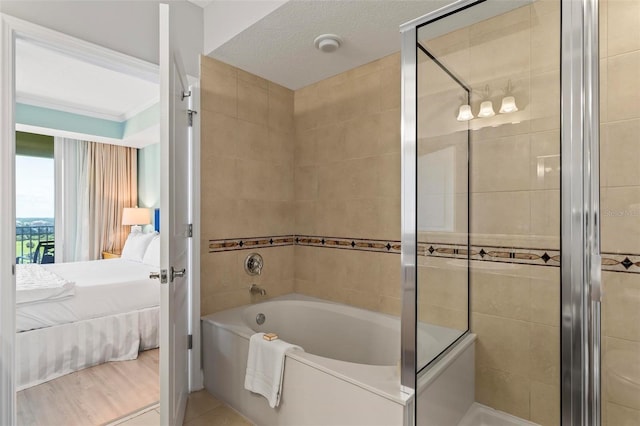 200 Ocean Crest Dr Unit 515, Palm Coast, FL 32137 - ensuite bathroom with a bath and tiled shower