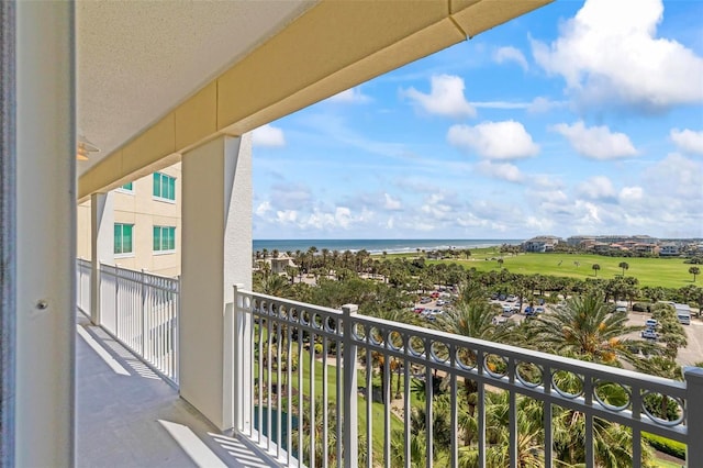 balcony featuring a water view