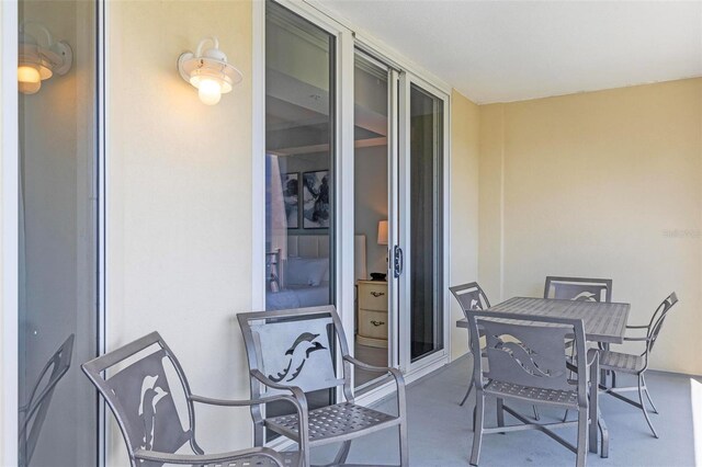 200 Ocean Crest Dr Unit 515, Palm Coast, FL 32137 - view of patio with outdoor dining area