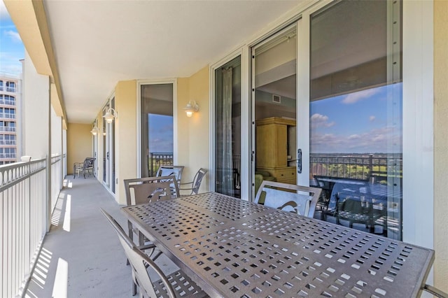 200 Ocean Crest Dr Unit 515, Palm Coast, FL 32137 - balcony featuring outdoor dining area