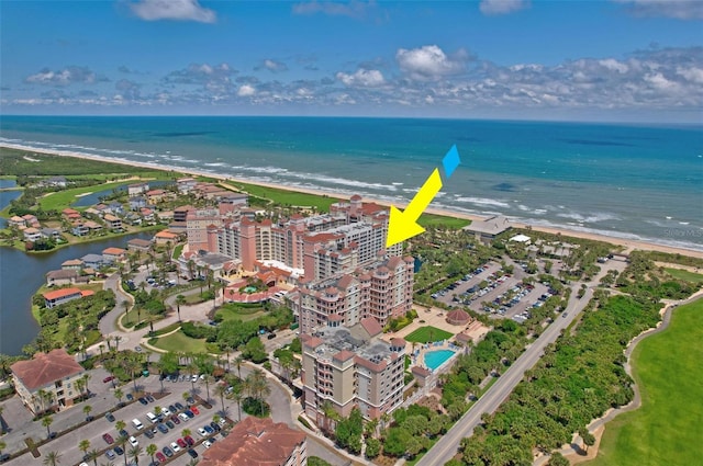 drone / aerial view with a view of the beach and a water view