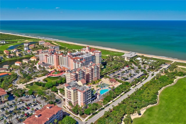 drone / aerial view with a view of the beach and a water view