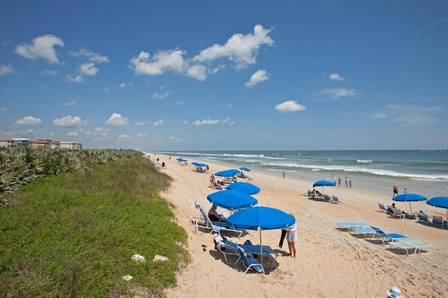 property view of water featuring a beach view