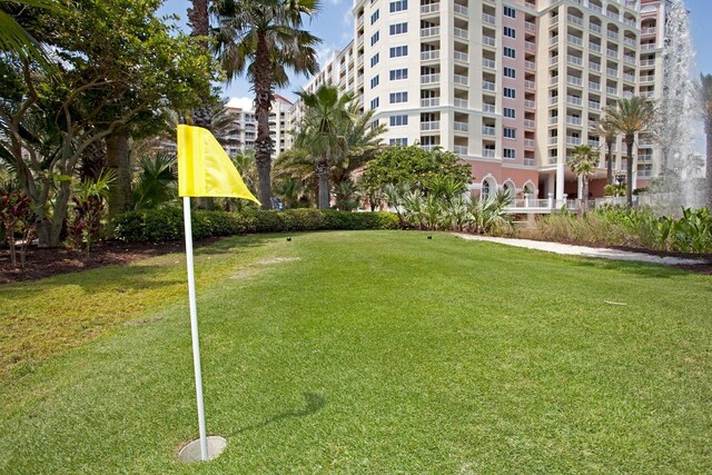 200 Ocean Crest Dr Unit 515, Palm Coast, FL 32137 - view of property's community with a lawn
