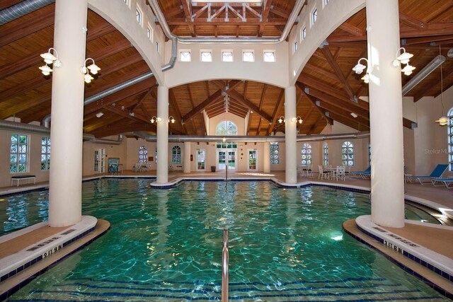 200 Ocean Crest Dr Unit 515, Palm Coast, FL 32137 - view of swimming pool featuring ornate columns