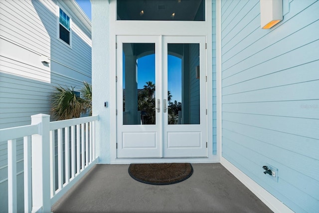 doorway to property featuring french doors