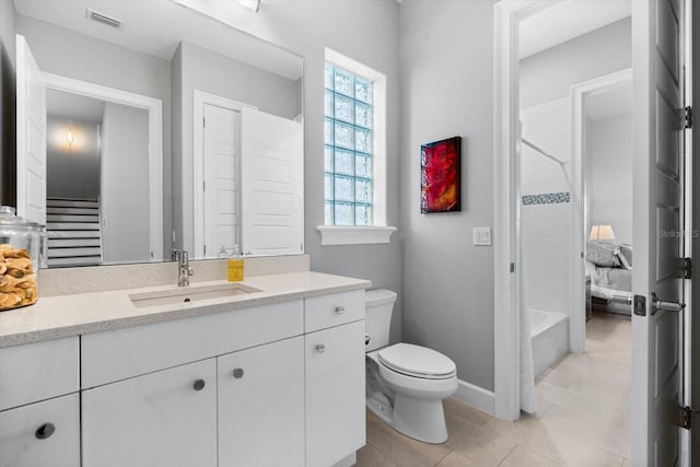 full bathroom with tile patterned flooring, vanity, toilet, and shower / washtub combination