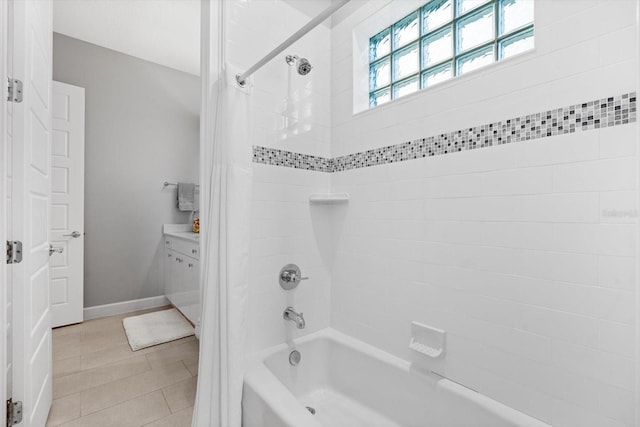 bathroom with shower / bath combination with curtain and tile patterned floors