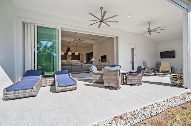 view of patio with ceiling fan