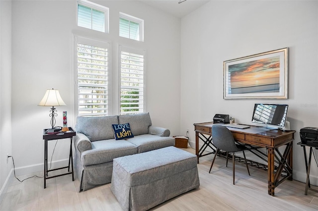 home office featuring light wood-type flooring