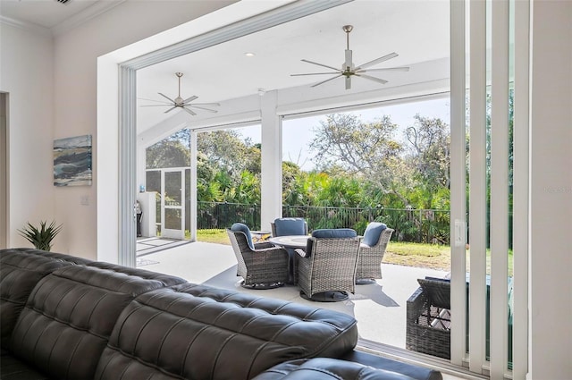 sunroom / solarium with ceiling fan