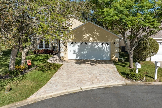 view of front of property featuring a garage