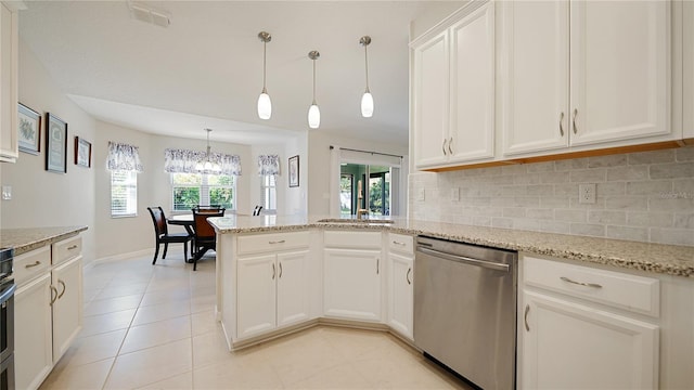 kitchen with decorative backsplash, stainless steel dishwasher, light stone counters, decorative light fixtures, and white cabinets