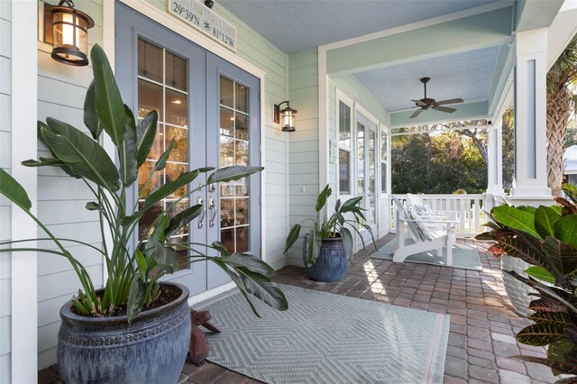 35 Smiling Fish Ln, Palm Coast, FL 32137 - covered porch featuring a ceiling fan