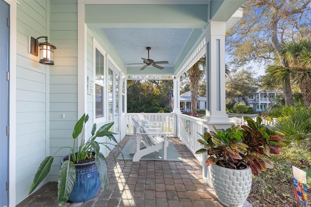 view of patio with a porch and a ceiling fan