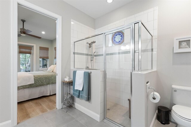 35 Smiling Fish Ln, Palm Coast, FL 32137 - full bathroom with ensuite bath, ceiling fan, toilet, a shower stall, and recessed lighting