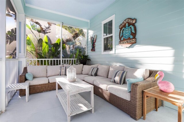 35 Smiling Fish Ln, Palm Coast, FL 32137 - sunroom with an outdoor hangout area