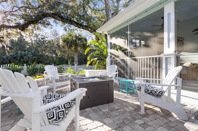 view of patio / terrace featuring fence