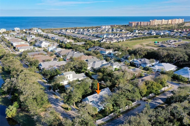 birds eye view of property featuring a residential view and a water view