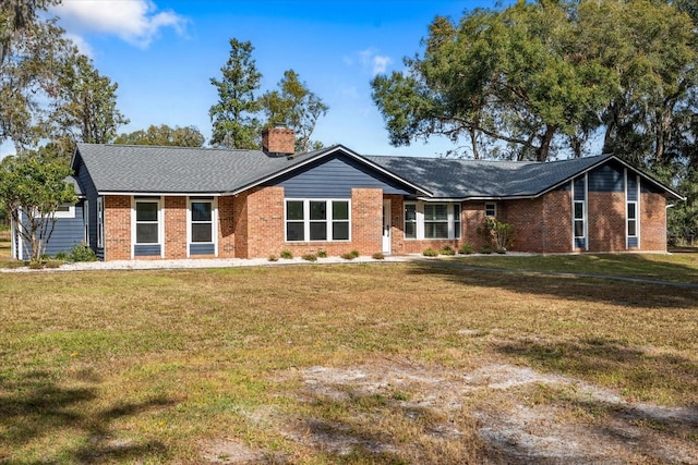 ranch-style home with a front yard
