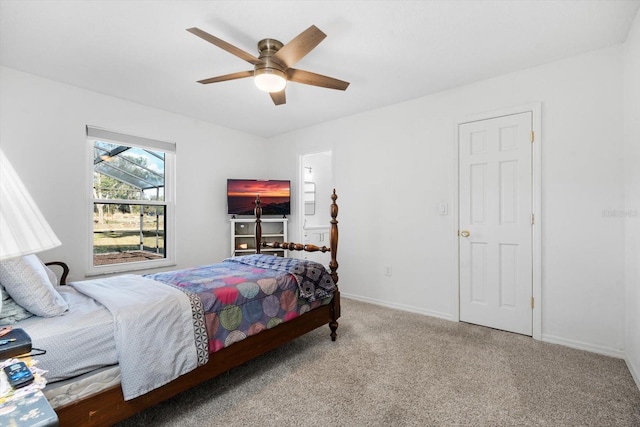 bedroom featuring ceiling fan and light colored carpet
