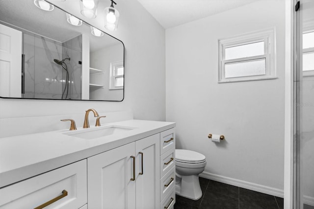 bathroom featuring tile patterned floors, vanity, toilet, and walk in shower