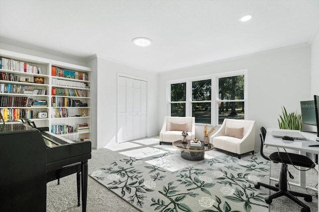 sitting room featuring carpet and ornamental molding