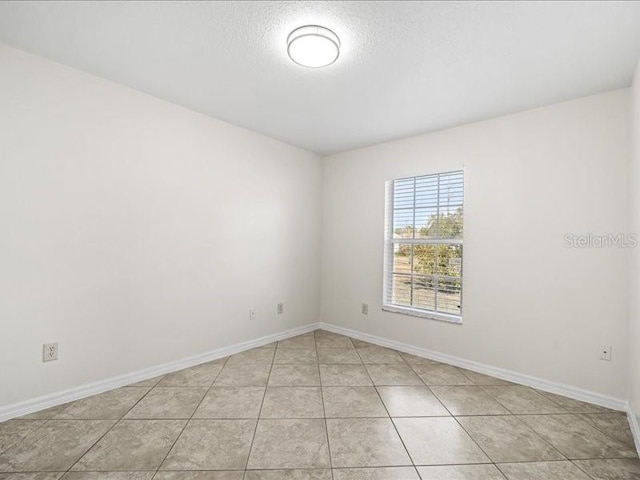 view of tiled empty room