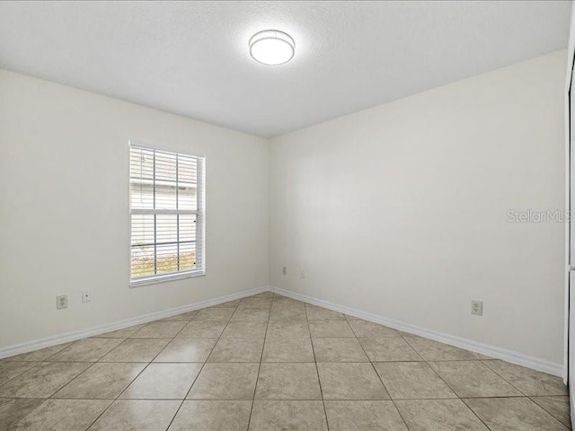 view of tiled empty room