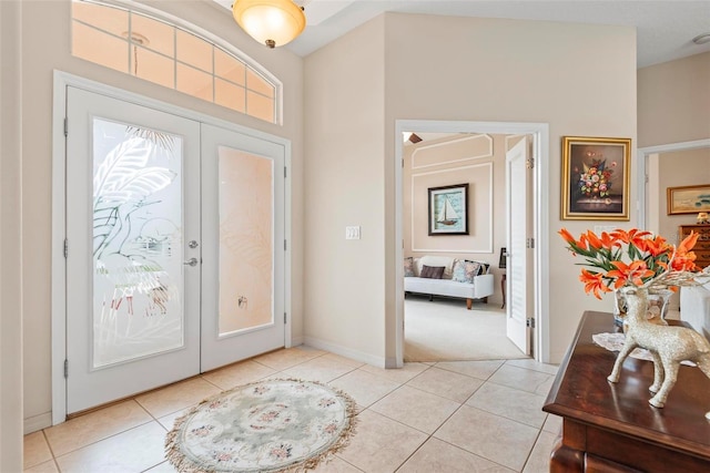 tiled foyer entrance with french doors