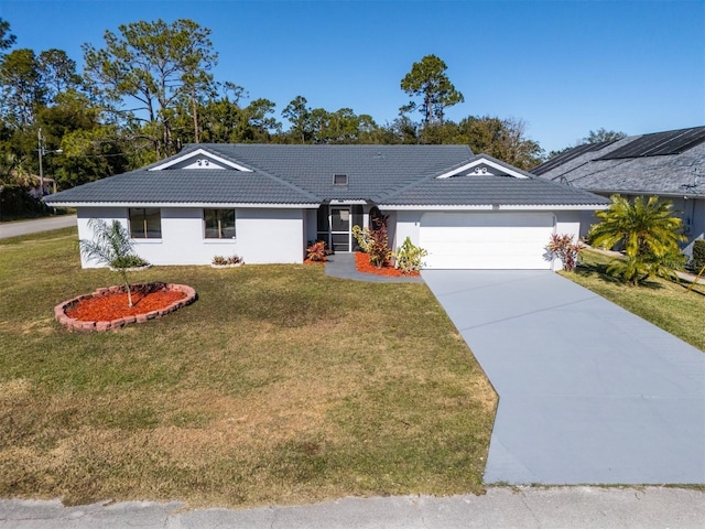 ranch-style house with a front yard and a garage