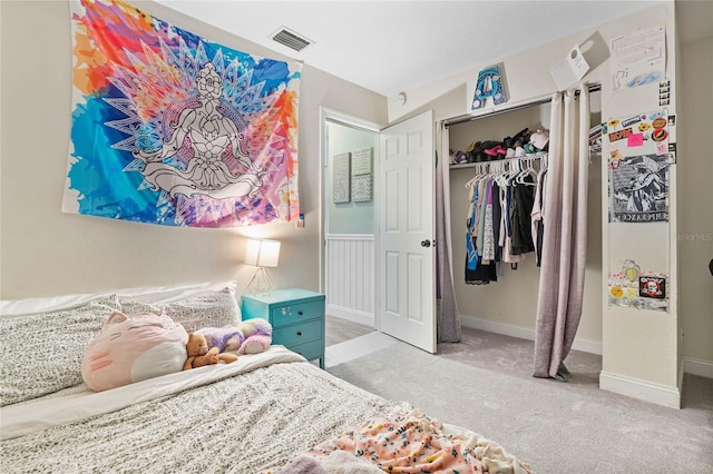 carpeted bedroom featuring a closet