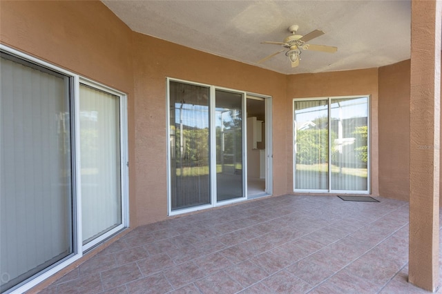 view of patio with ceiling fan