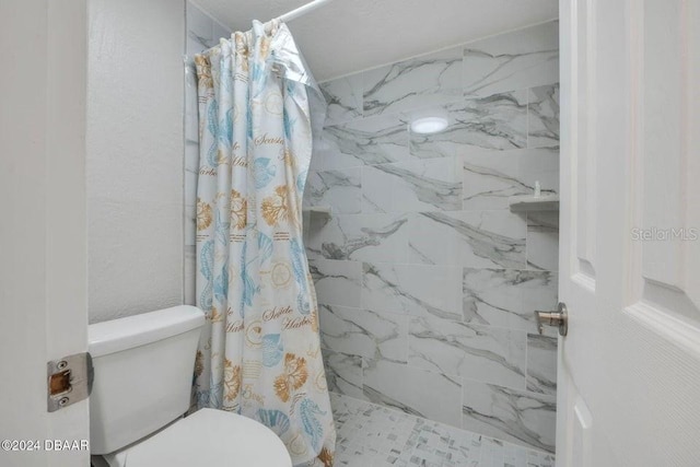 313 S Atlantic Ave Unit 5230, Daytona Beach, FL 32118 - full bathroom featuring tiled shower and toilet