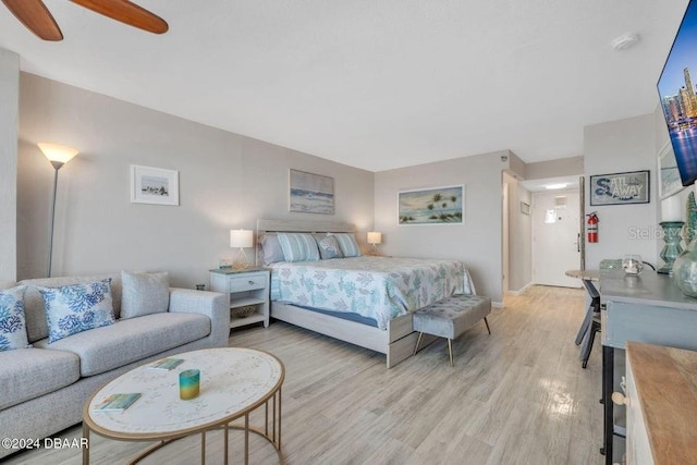 313 S Atlantic Ave Unit 5230, Daytona Beach, FL 32118 - bedroom with light wood-style floors and ceiling fan