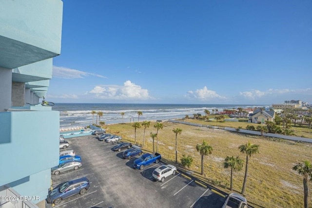 aerial view featuring a beach view and a water view