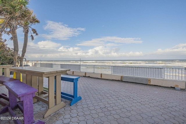 313 S Atlantic Ave Unit 5230, Daytona Beach, FL 32118 - view of patio / terrace featuring view of water and beach