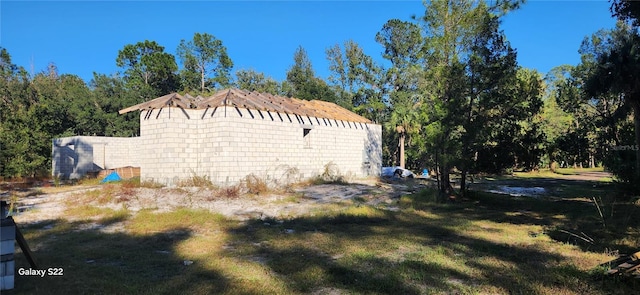 view of home's exterior featuring a lawn