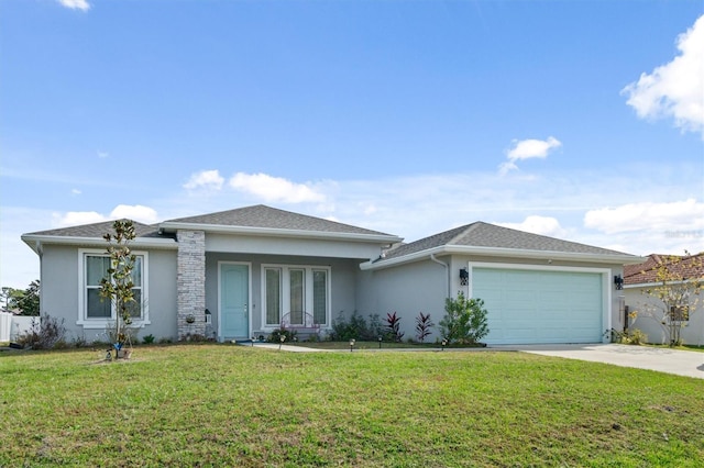 view of front of house featuring a front lawn and a garage