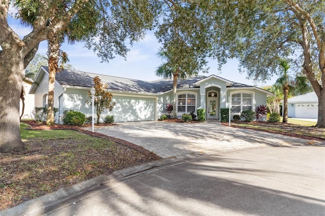 single story home with a garage