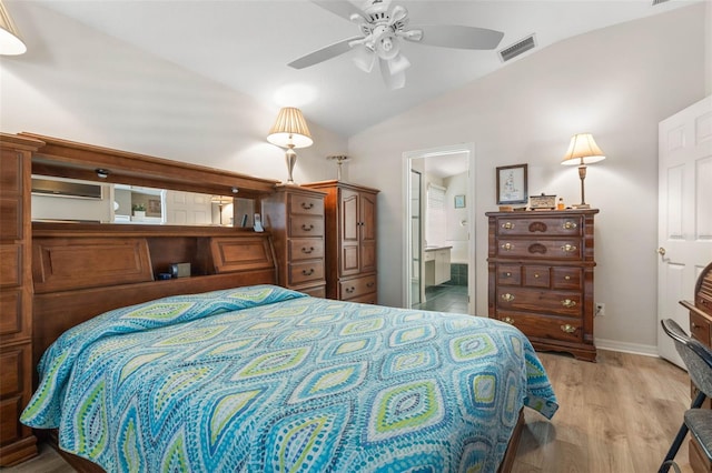 bedroom with ensuite bathroom, ceiling fan, lofted ceiling, and light wood-type flooring