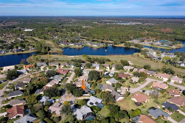 drone / aerial view with a water view