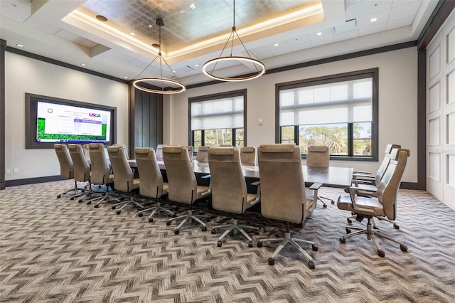 dining area featuring light colored carpet, a wealth of natural light, and a tray ceiling