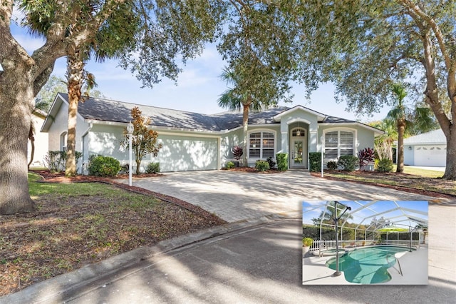 single story home featuring a lanai