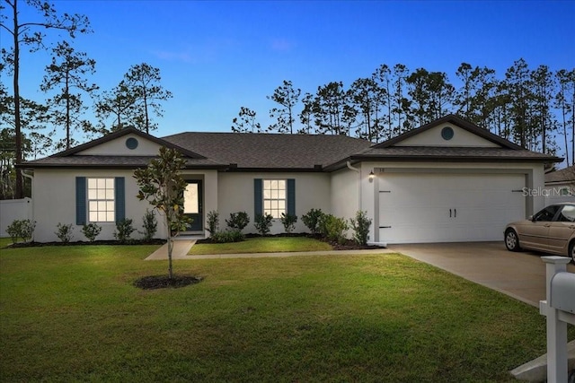 ranch-style home featuring a garage and a front lawn